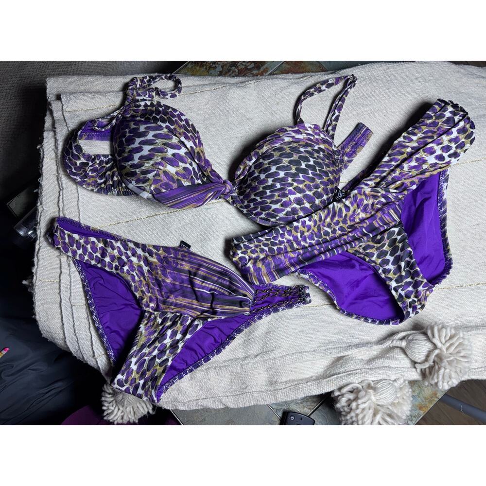 Three piece swim set, Becca, size small bottoms and medium top. Animal print.
